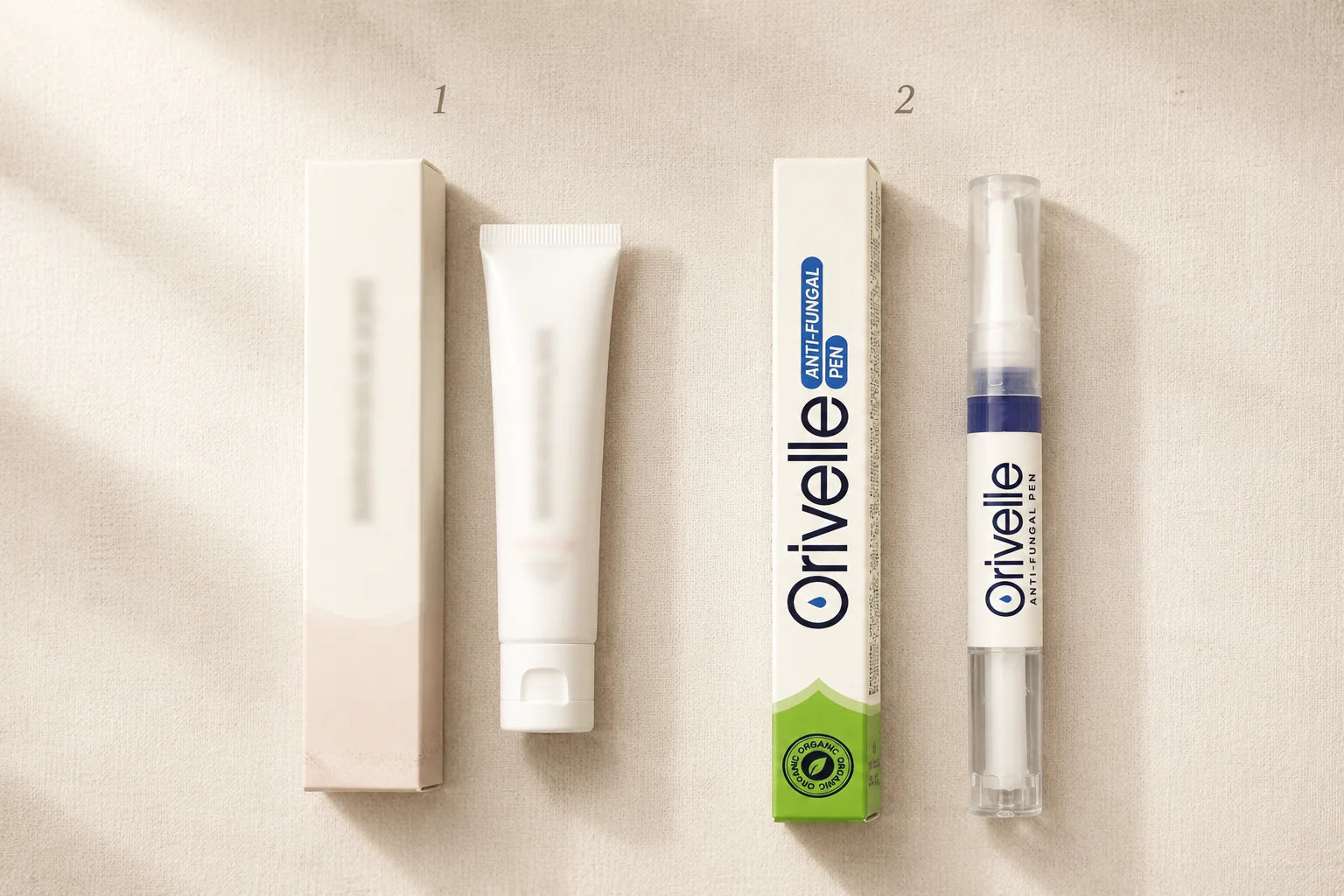 Editorial side-by-side product photograph showing a generic drugstore nail-repair tube on the left and the Orivelle Antifungal Pen with its green-and-white box on the right, on a warm cream linen surface.