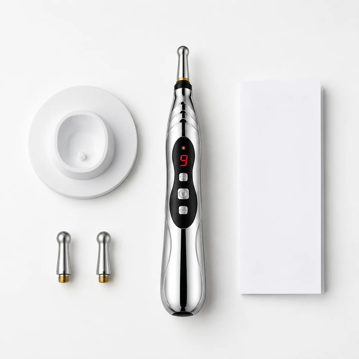 What's in the box: pen, stand, spare heads and guide