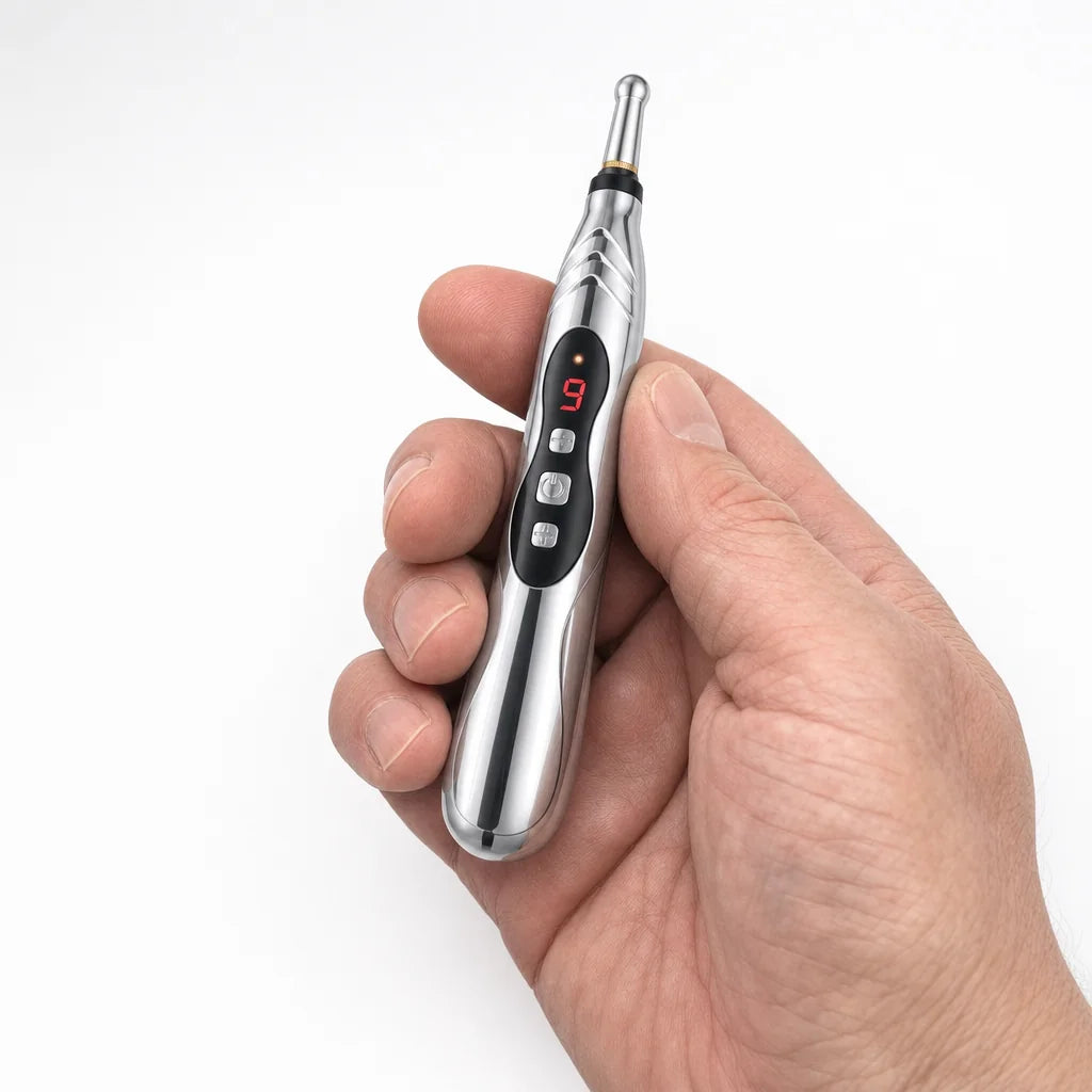Tinnito pen held in a hand for scale thumbnail